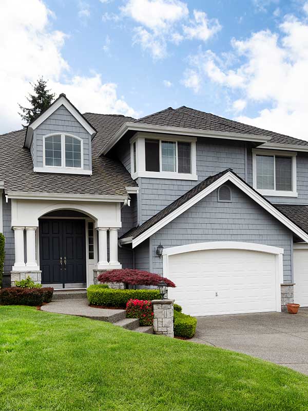 Big house with green garden